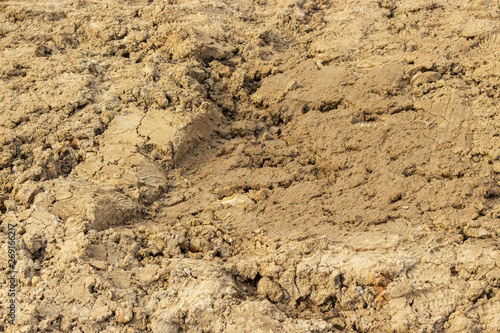 Ground dirt soil soil sand clay alumina texture background close-up