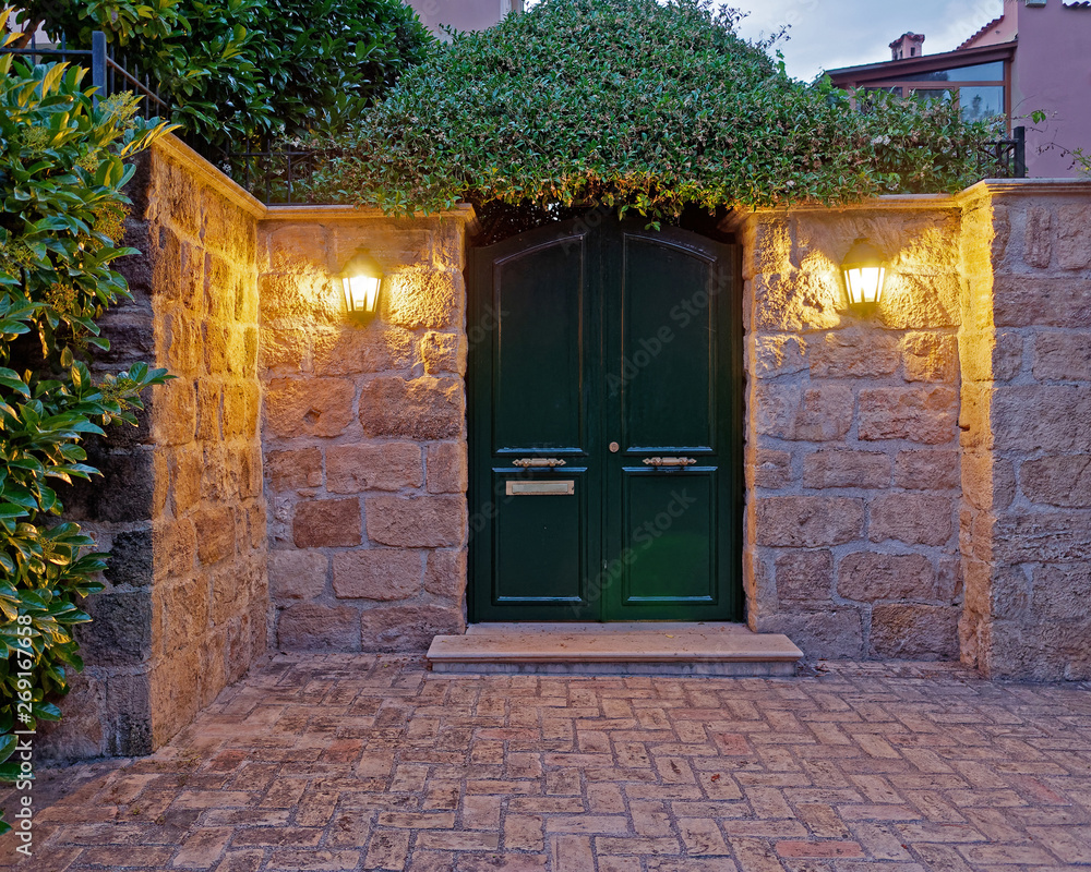 vintage house entrance dark green door late in the afternoon Stock ...
