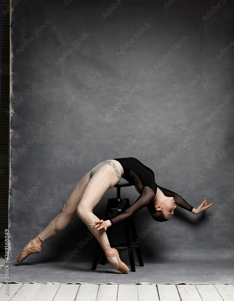 one ballerina dancing on a retro background one ballerina dancing on a retro background