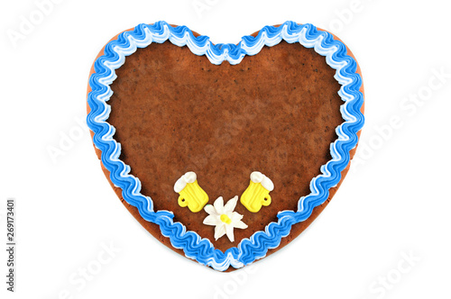 Oktoberfest Gingerbread heart cookie with ornaments and copy space