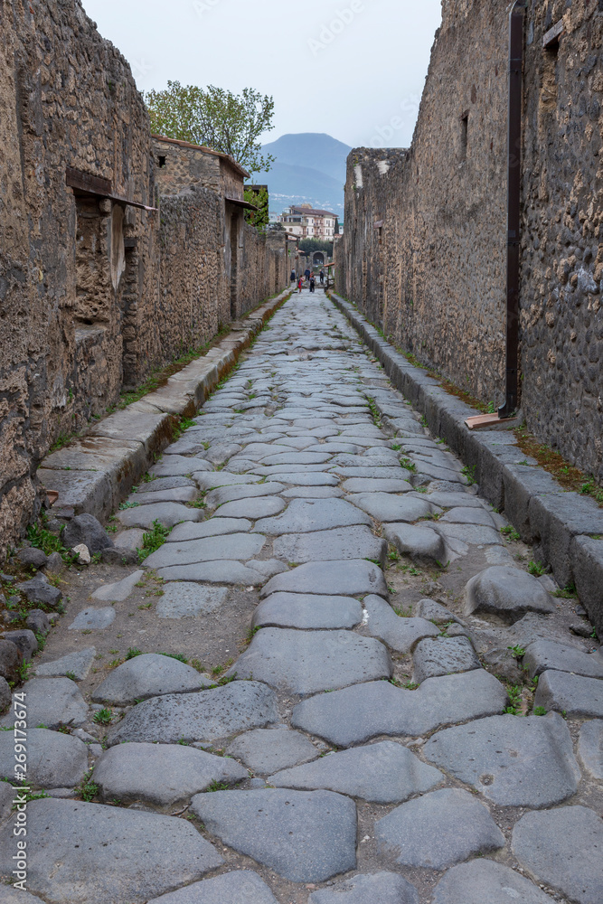 Pompeii, Italy. 04-22-2019. Paved street at  antique roman city of Pompeii, Italy.