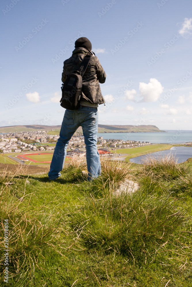 Man Photographing Lerwick in Shetland