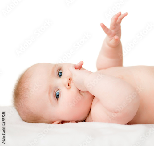 Cute baby lying on the blanket isolated on white