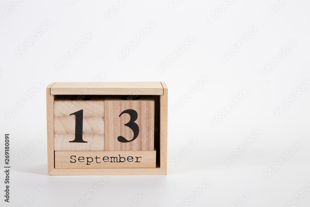Wooden calendar September13 on a white background Wooden calendar September13 on a white background