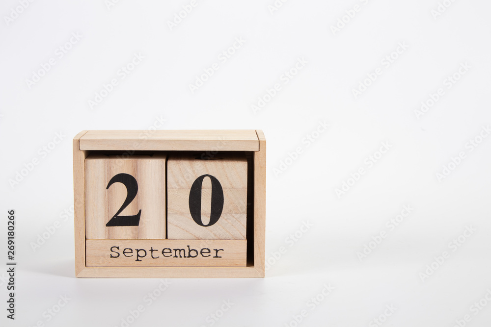 Wooden calendar September 20 on a white background Wooden calendar September 20 on a white background