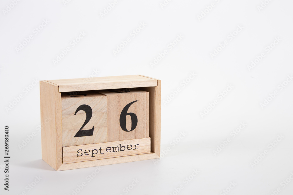 Wooden calendar September 26 on a white background Wooden calendar September 26 on a white background