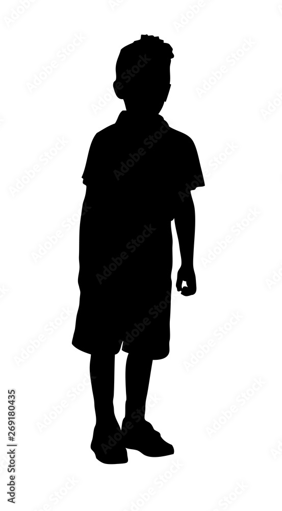 Silhouette of a little boy standing