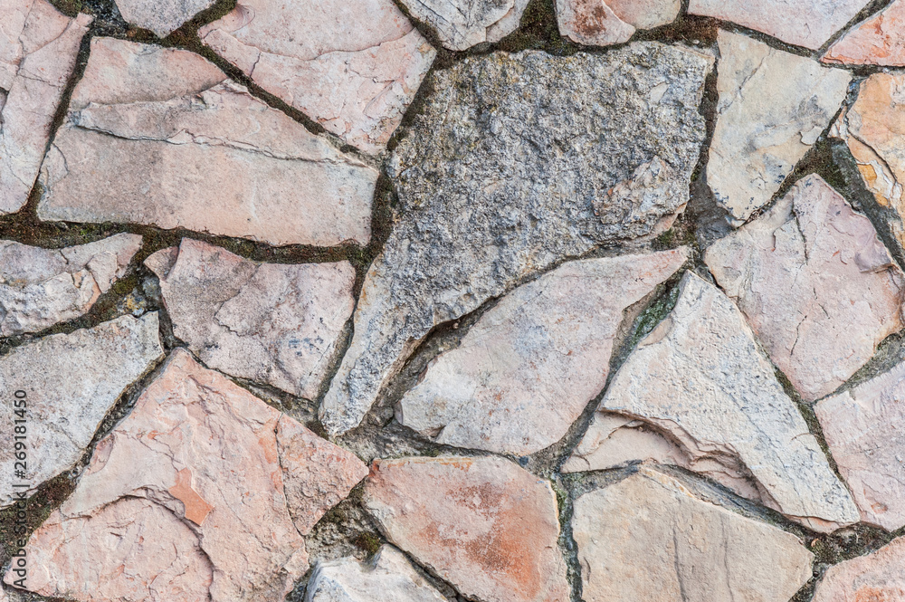 Obraz premium abstract background of pink and gray stone wall close up