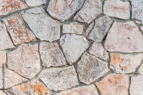 abstract background of pink and gray stone wall close up
