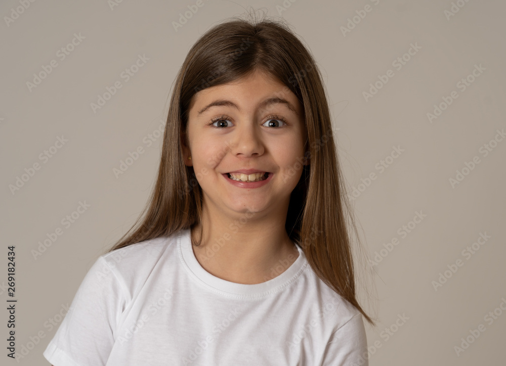 Portrait of a beautiful clever child with a happy, cheerful face looking confident. Human emotions Portrait of a beautiful clever child with a happy, cheerful face looking confident. Human emotions
