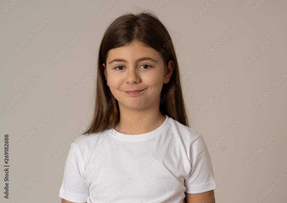 Portrait of a beautiful clever child with a happy, cheerful face looking confident. Human emotions Portrait of a beautiful clever child with a happy, cheerful face looking confident. Human emotions