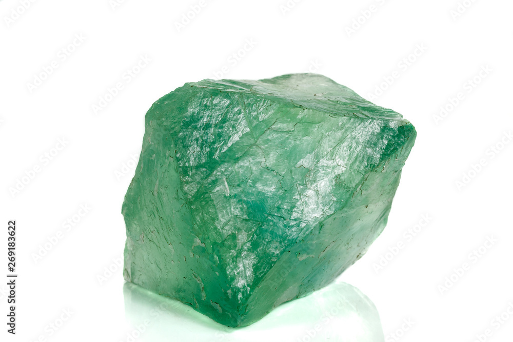 Macro stone green fluorite mineral on white background Macro stone green fluorite mineral on white background