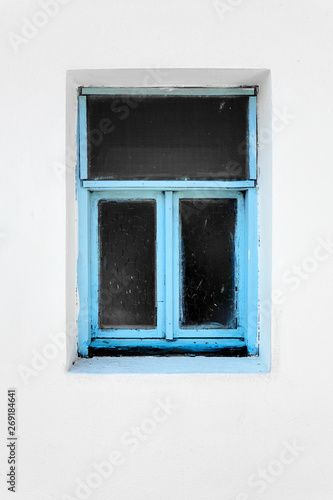 Old vintage blue window on white wall