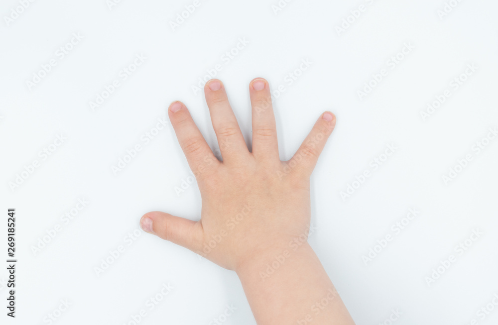 This is a capture for a child hand on a white background in a studio light This is a capture for a child hand on a white background in a studio light