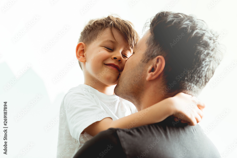 Father and Son hugging - obrazy, fototapety, plakaty 