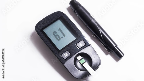 black plastic blood glucose detector 