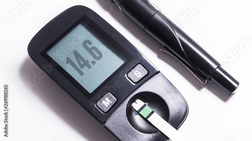 black plastic blood glucose detector 
