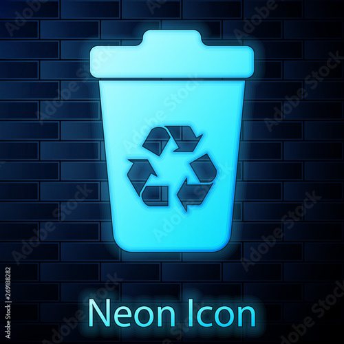 Glowing neon Recycle bin with recycle symbol icon isolated on brick wall background. Trash can icon. Garbage bin sign. Recycle basket sign. Vector Illustration