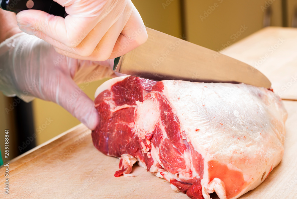 Separation of a raw mutton meat with rib