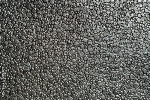 Black metalic polystyrene foam full frame macro background