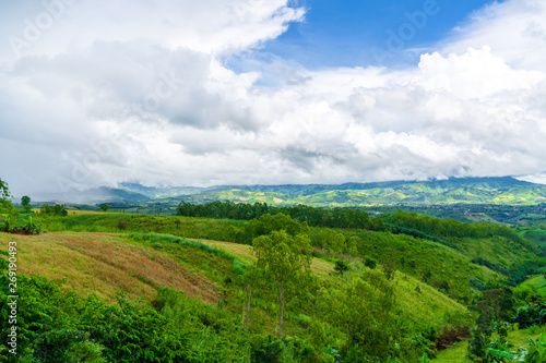 Blue sky high peak mountains fog hills mist scenery national park views at Phu Tub Berk, Khao Koh, Phetchabun Province, Thailand