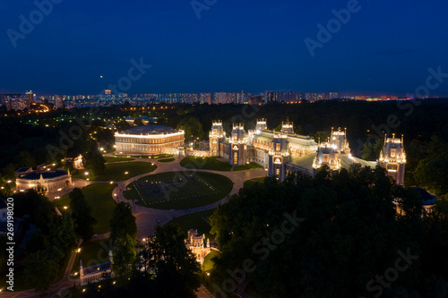 palace in the night with city on horizon