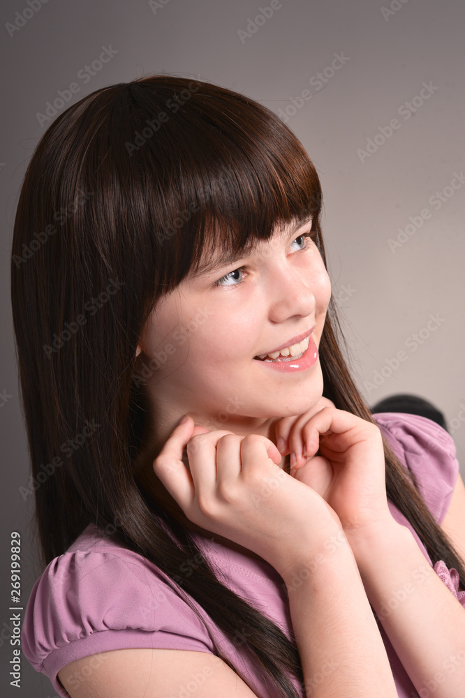 Portrait of beautiful girl posing in studio Portrait of beautiful girl posing in studio