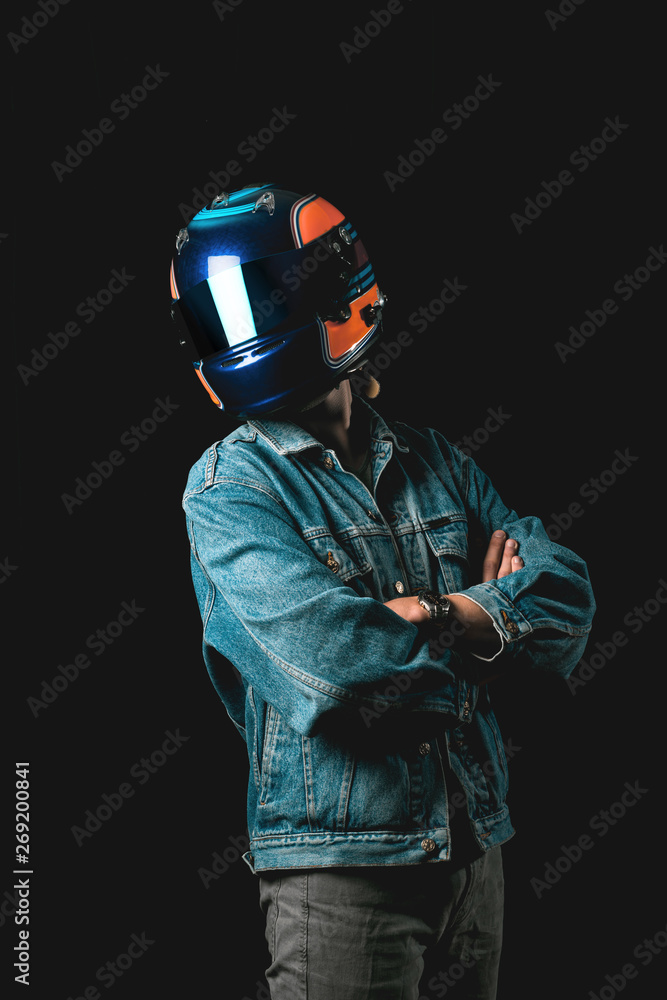 Young man with racing helmet, hitman, millennial