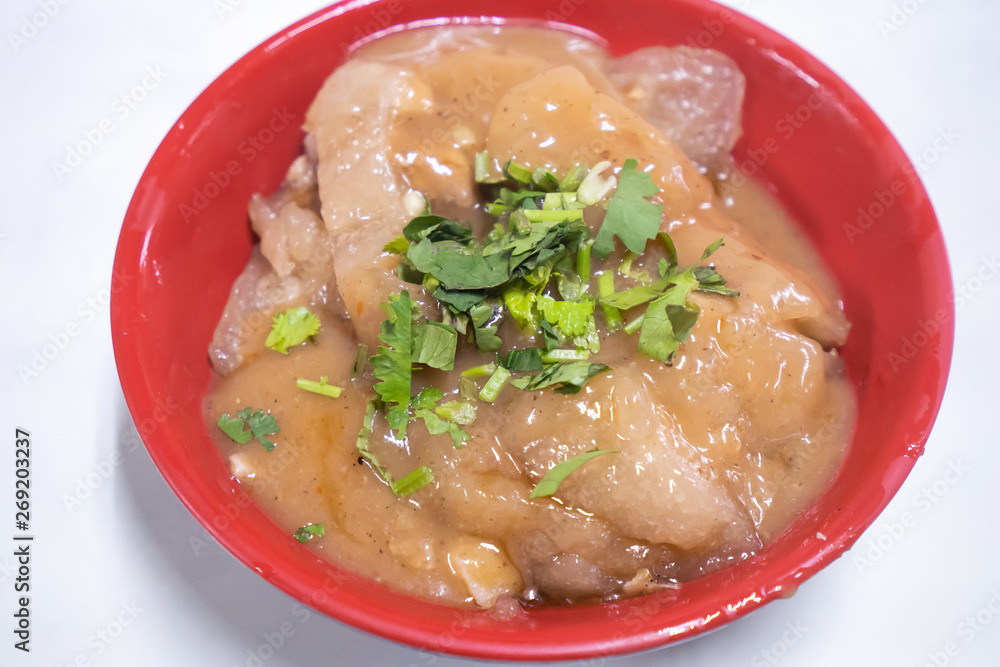 Bawan (Ba wan), taiwanese meatball delicacy, delicious street food, fried starch wrapped round shaped dumpling with pork inside, close up, copy space Bawan (Ba wan), taiwanese meatball delicacy, delicious street food, fried starch wrapped round shaped dumpling with pork inside, close up, copy space