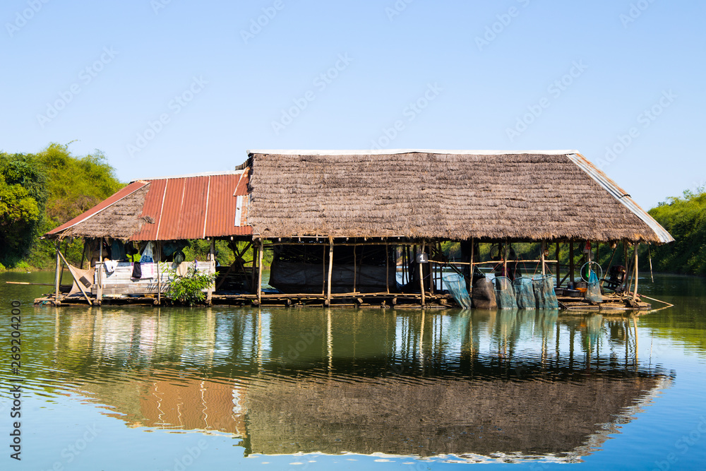 SAKON NAKHON, THAILAND, JANUARY 19, 2019 - Houseboat used for fishing on the river in Isan, North east Thailand, Asia. SAKON NAKHON, THAILAND, JANUARY 19, 2019 - Houseboat used for fishing on the river in Isan, North east Thailand, Asia.