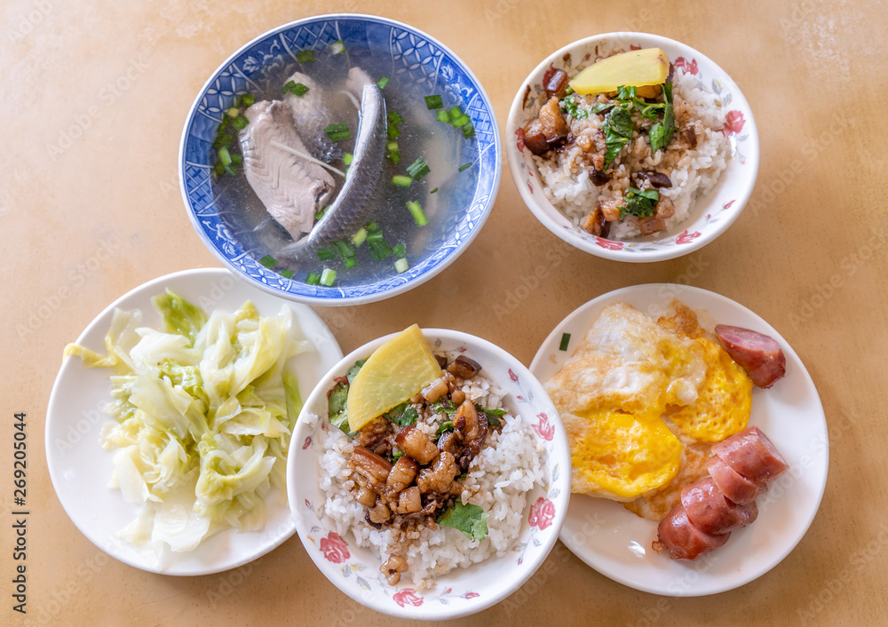 Braised pork over rice - Taiwan famous traditional street food delicacy. Soy-stewed pork on rice. Travel design concept. Top view,copy space,close up Braised pork over rice - Taiwan famous traditional street food delicacy. Soy-stewed pork on rice. Travel design concept. Top view,copy space,close up