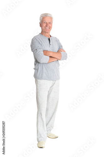 Senior man posing isolated on white background, full length