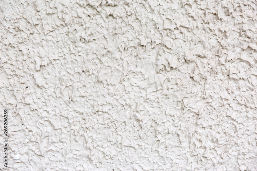Plaster wall background. Grainy white rough texture. Plaster wall background. Grainy white rough texture.