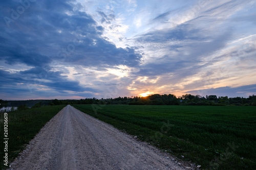 dirty gravel countryside gravel road in summer