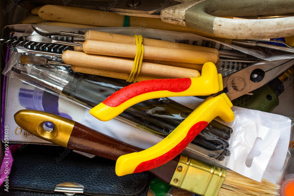 Randomly stacked art tools. Close up top view. Randomly stacked art tools. Close up top view.