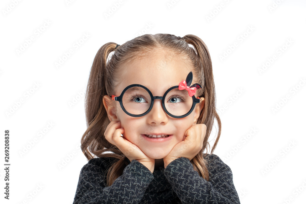 beautiful cute little girl smiling and looking up on white background beautiful cute little girl smiling and looking up on white background