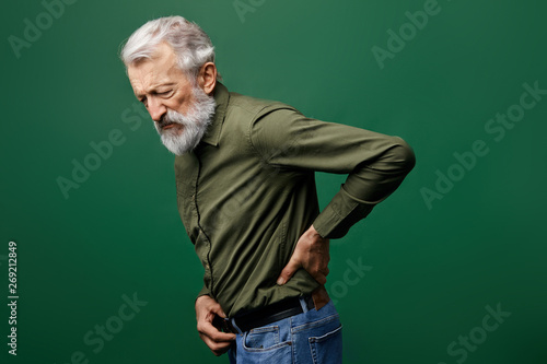 Obraz na plátně old man suffering from referred pain in the back