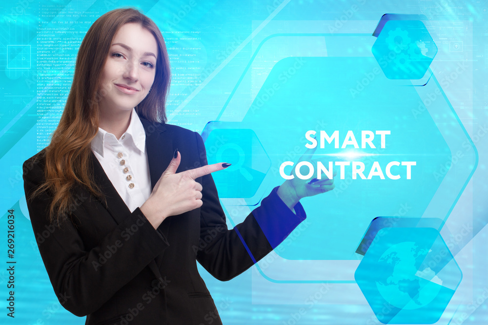 The concept of business, technology, the Internet and the network. A young entrepreneur working on a virtual screen of the future and sees the inscription: Smart contract The concept of business, technology, the Internet and the network. A young entrepreneur working on a virtual screen of the future and sees the inscription: Smart contract