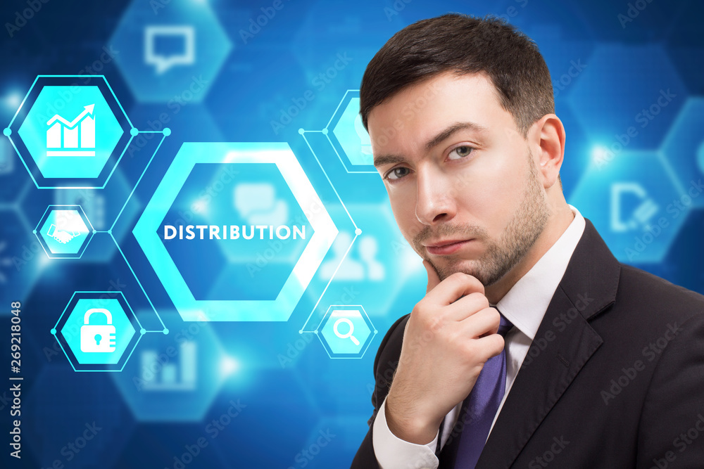 The concept of business, technology, the Internet and the network. A young entrepreneur working on a virtual screen of the future and sees the inscription: Distribution The concept of business, technology, the Internet and the network. A young entrepreneur working on a virtual screen of the future and sees the inscription: Distribution
