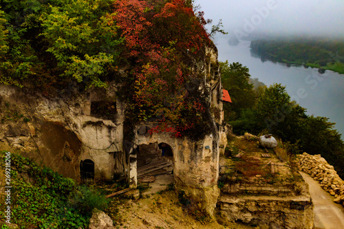 Lyadovsky rocky monastery is a male monastery located on a rocky terrace of the 90-meter high mountain over the Dniester river on its left bank, near Lyadova village in Vinnytsya region, Ukraine photo