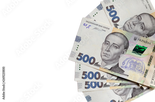 Ukrainian new money hryvnia on white background isolated. Top view, copy space for text.