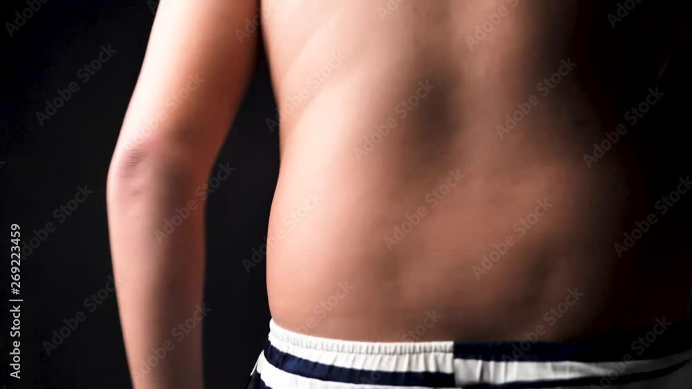 Fat preteen boy move and shake his tummy, slow motion ...