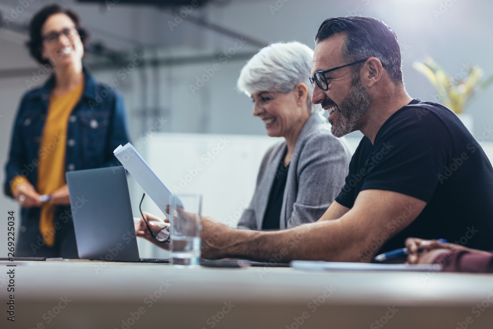 Happy business people in a meeting Happy business people in a meeting