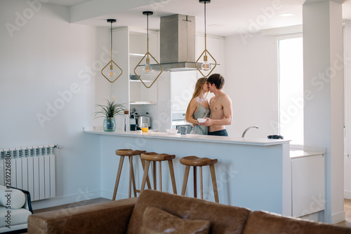 Couple having breakfast at home