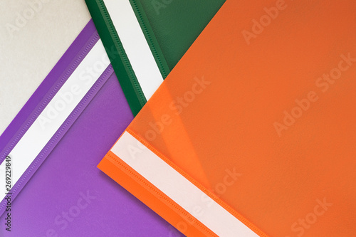Plastic folders in three colors.
