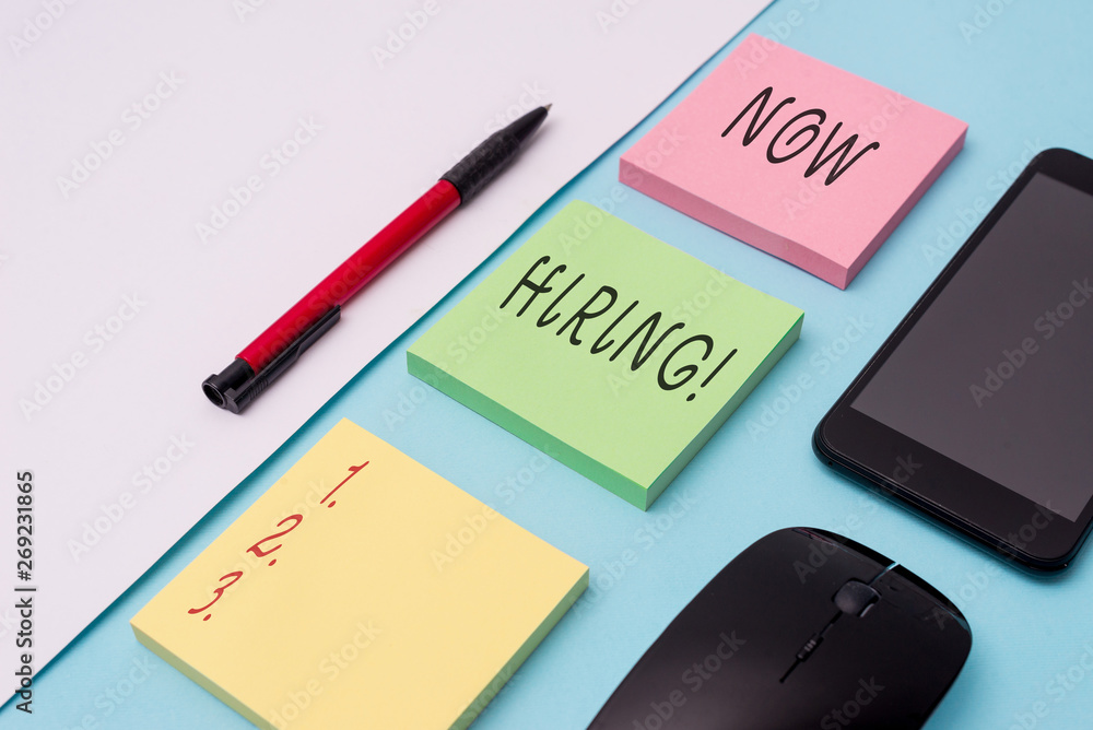 Word writing text Now Hiring. Business photo showcasing finding evaluating working relationship with future employees Note papers and stationary plus gadgets placed sideways above backdrop Word writing text Now Hiring. Business photo showcasing finding evaluating working relationship with future employees Note papers and stationary plus gadgets placed sideways above backdrop