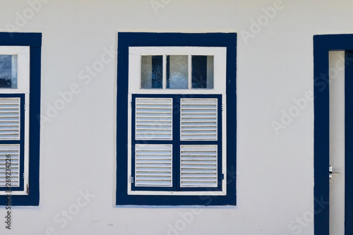 Colonial blue door with dark blue frame, made of wood, church of the Pirenopolis matrix