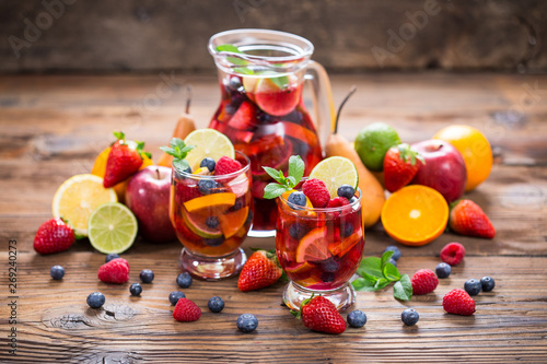 Summer cold cocktail, Sangria drink with fruit 