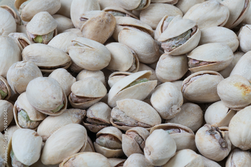 flat lay, close up pistachio nuts. For texture or background