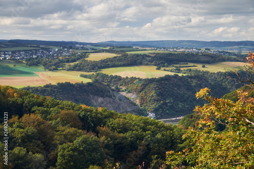 Aerial view to hills and agriculture fields of Rheinland-Pfalz state with river Rhein from tourist route on Hesse land